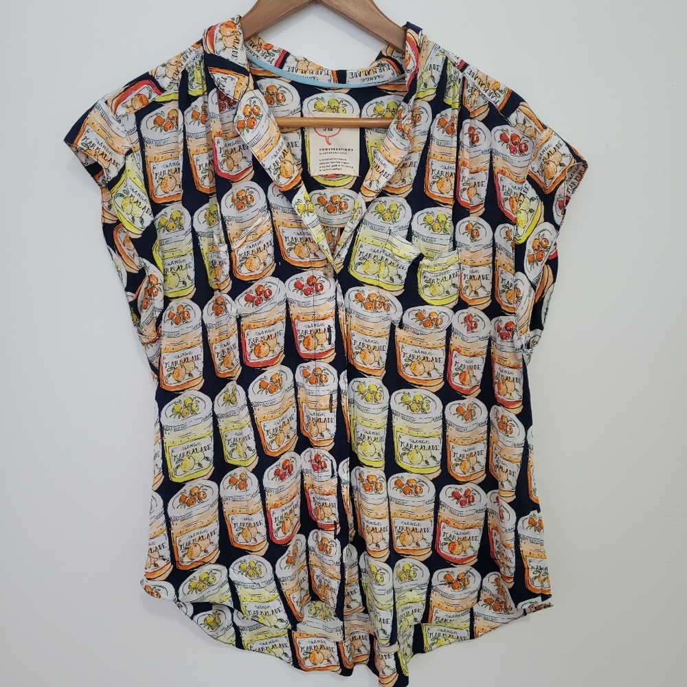 Anthropologie short sleeve button down top with homemade jams pattern